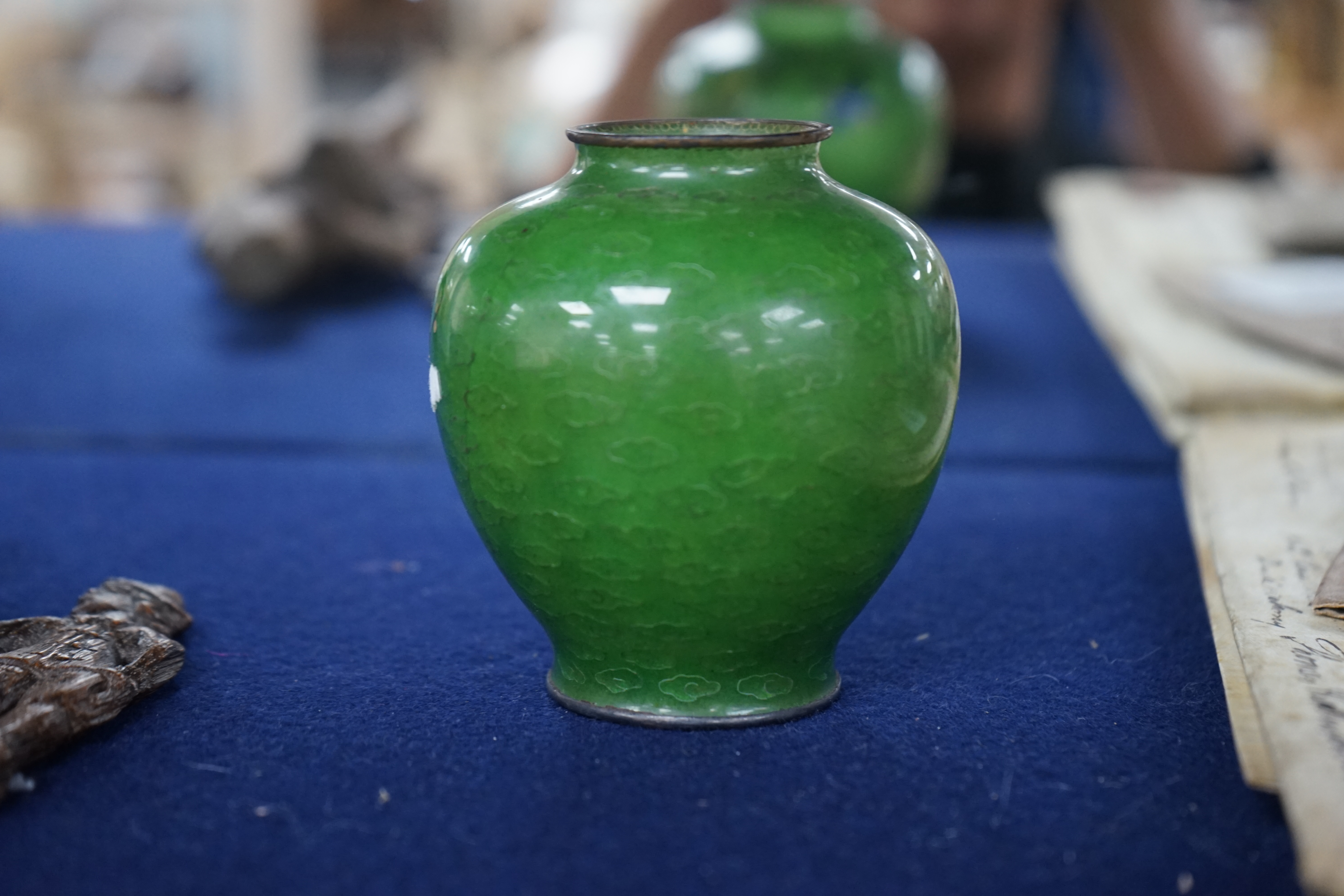 A Japanese silver wire plique a jour enamel green ground vase, early 20th century, 8.5cm. Condition - large cracks to body otherwise reasonable